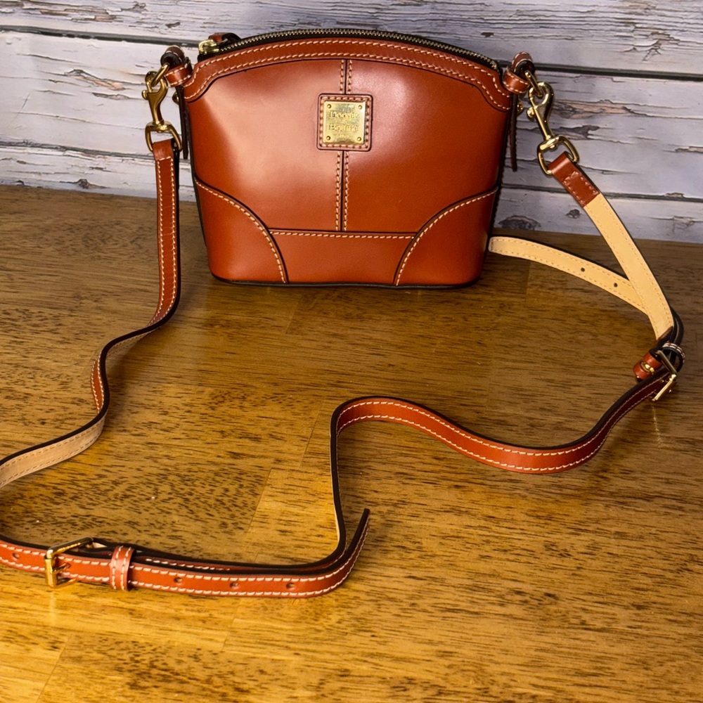 Dooney & Bourke Beacon mini domed crossbody bag.